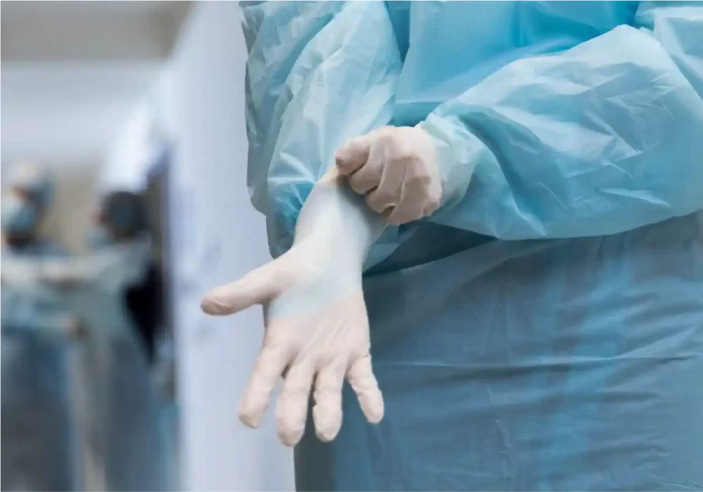 Surgical oncologist performing cancer surgery